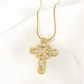 This dazzling cross-over necklace is lined with cubic zirconia. This not so- subtle piece sparkles beautifully in the light. It is an elegant yet bold piece that is perfect for everyday wear. 